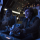 Chewbacca and Han Solo (Alden Ehrenreich) get settled in their new ship, the Millennium Falcon.